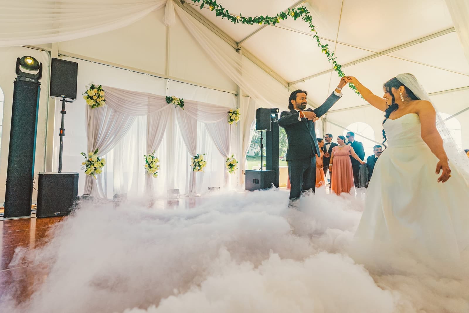 First dance under a tent with low-lying dry-ice clouds rolling across the floor