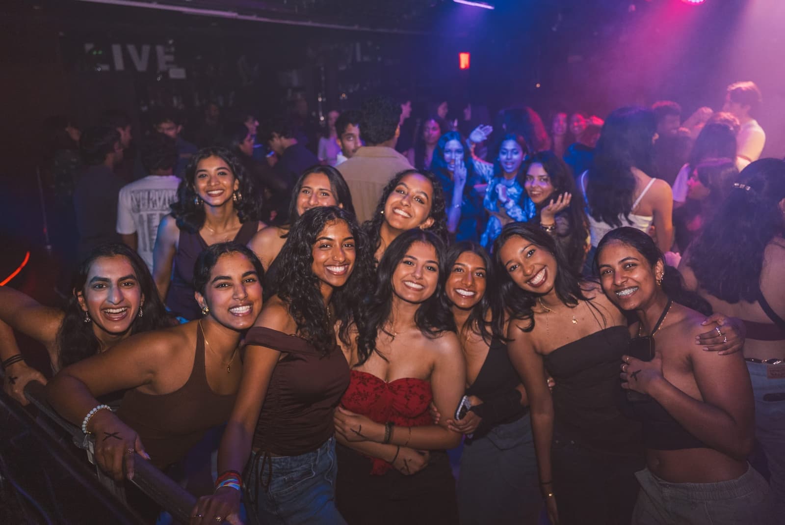 Guests posing together, captured by one of Amped Entertainment’s photography partners